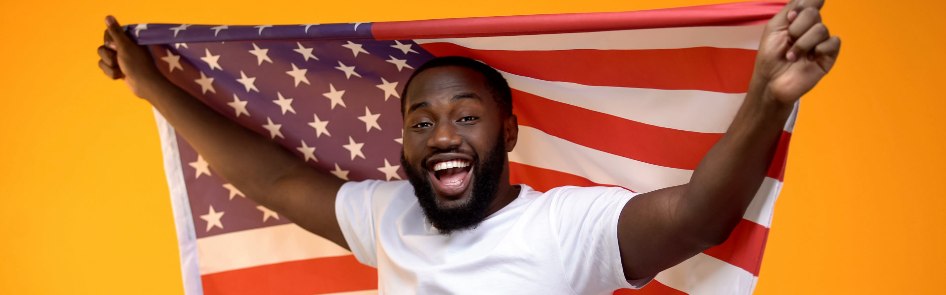 man holding US flag